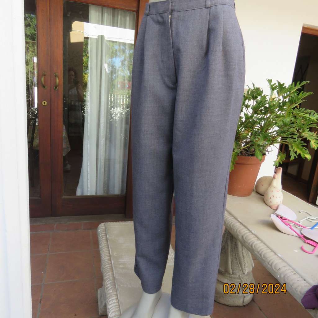 Classic pebble grey dress pants by PRINCESS from 80`s. Wool/polyester blend. Size 36/12.As new