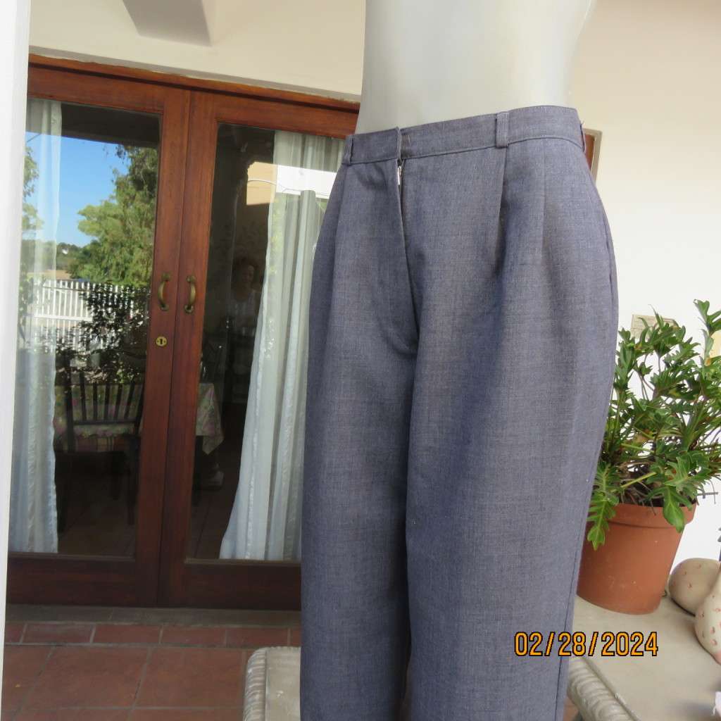 Classic pebble grey dress pants by PRINCESS from 80`s. Wool/polyester blend. Size 36/12.As new