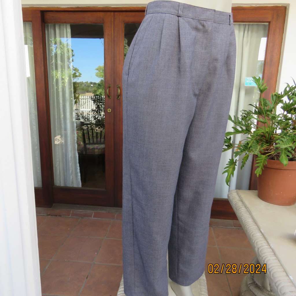 Classic pebble grey dress pants by PRINCESS from 80`s. Wool/polyester blend. Size 36/12.As new