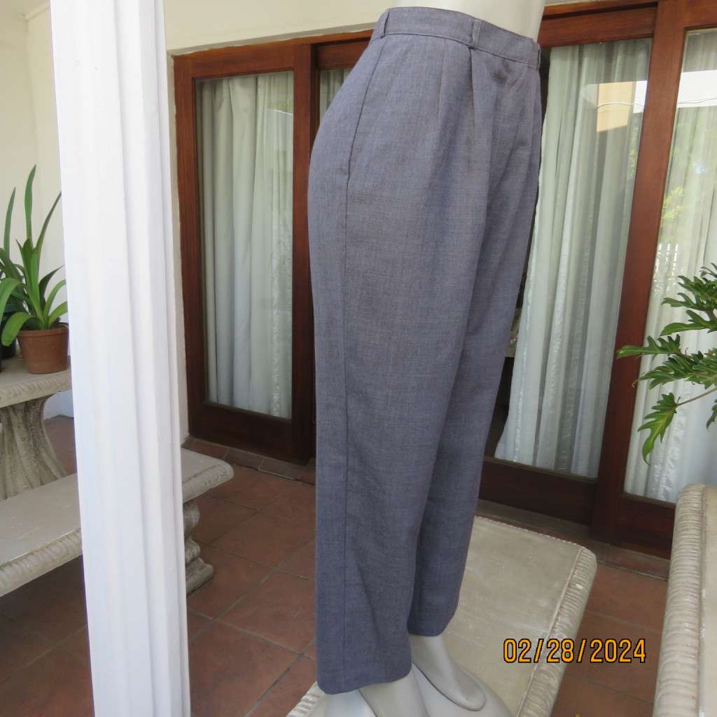 Classic pebble grey dress pants by PRINCESS from 80`s. Wool/polyester blend. Size 36/12.As new