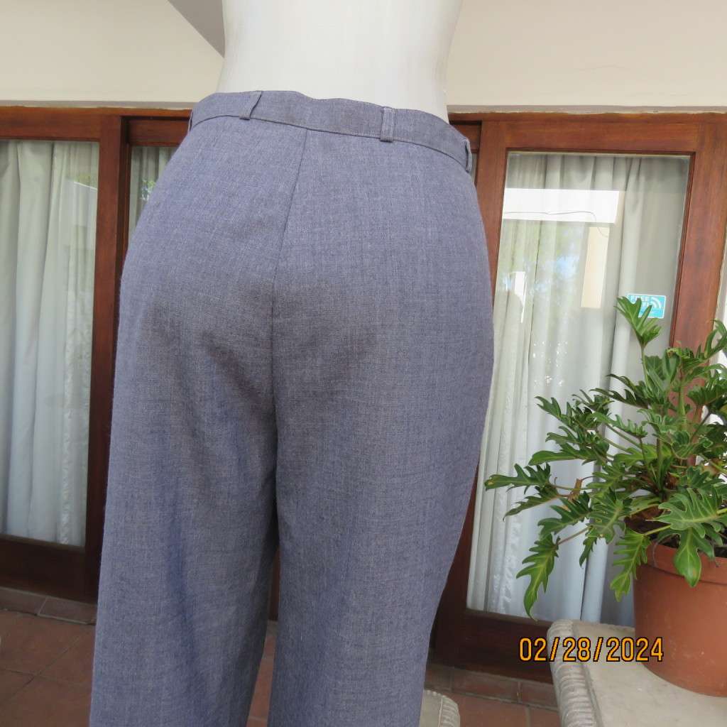 Classic pebble grey dress pants by PRINCESS from 80`s. Wool/polyester blend. Size 36/12.As new