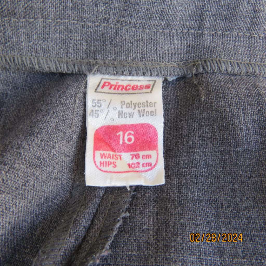Classic pebble grey dress pants by PRINCESS from 80`s. Wool/polyester blend. Size 36/12.As new