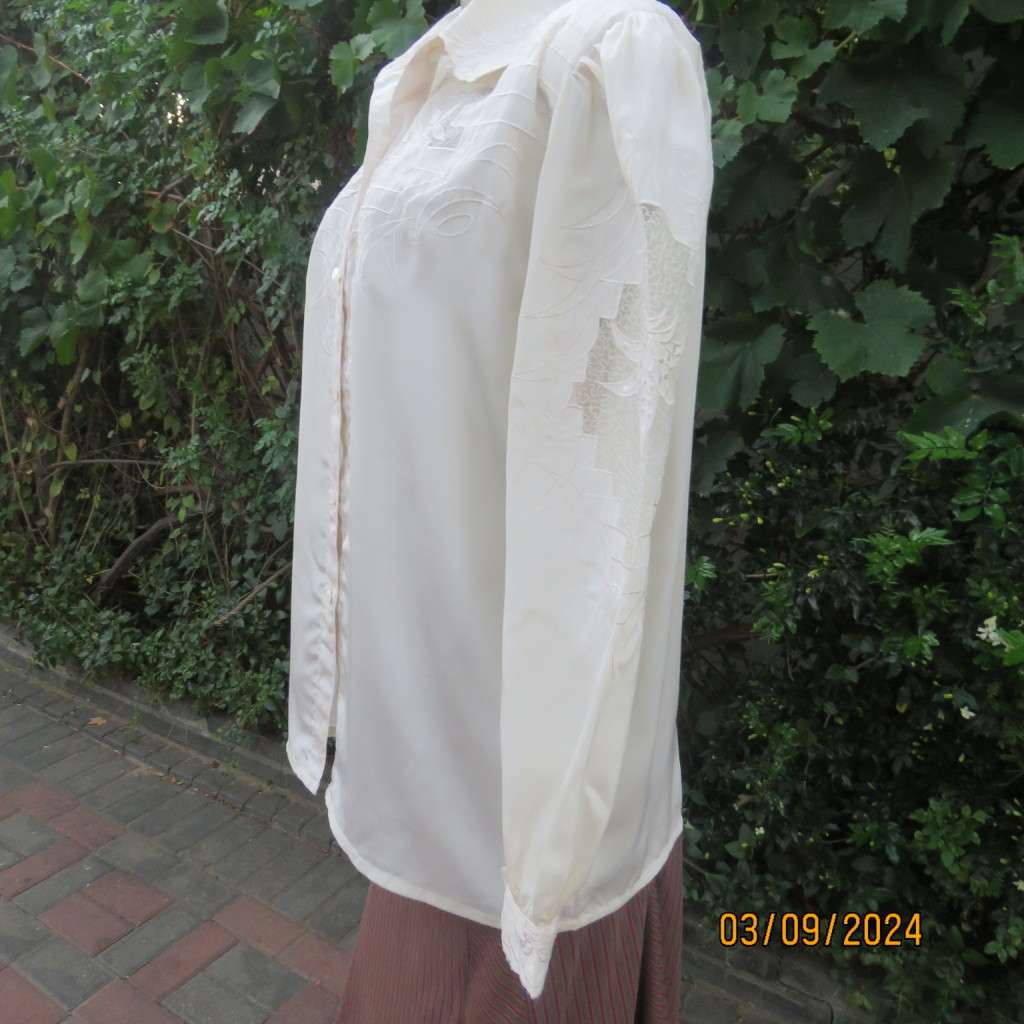 Just amazing rich cream long sleeve luxury embroidered blouse. Large size 40. Label cut. Brand new.