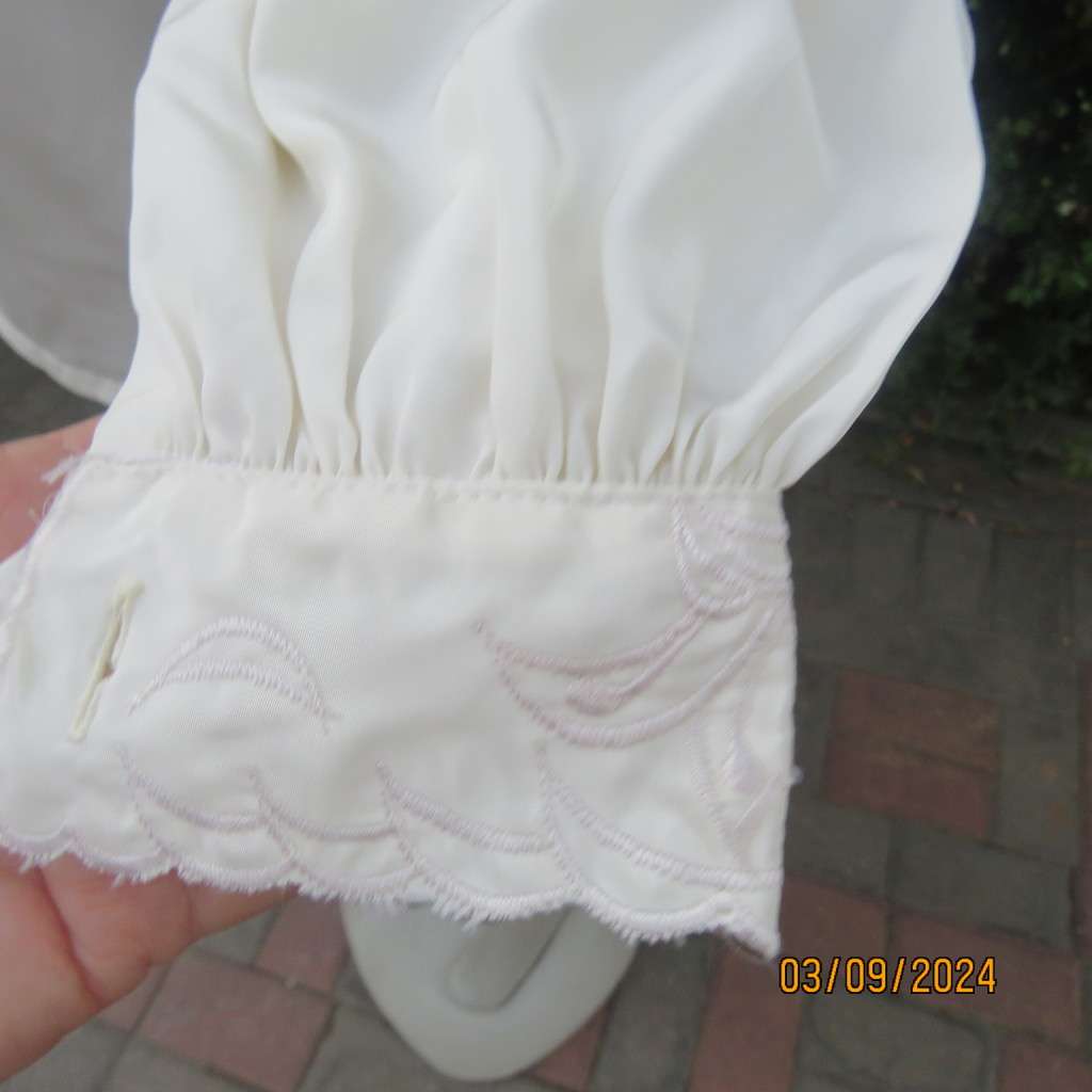 Just amazing rich cream long sleeve luxury embroidered blouse. Large size 40. Label cut. Brand new.