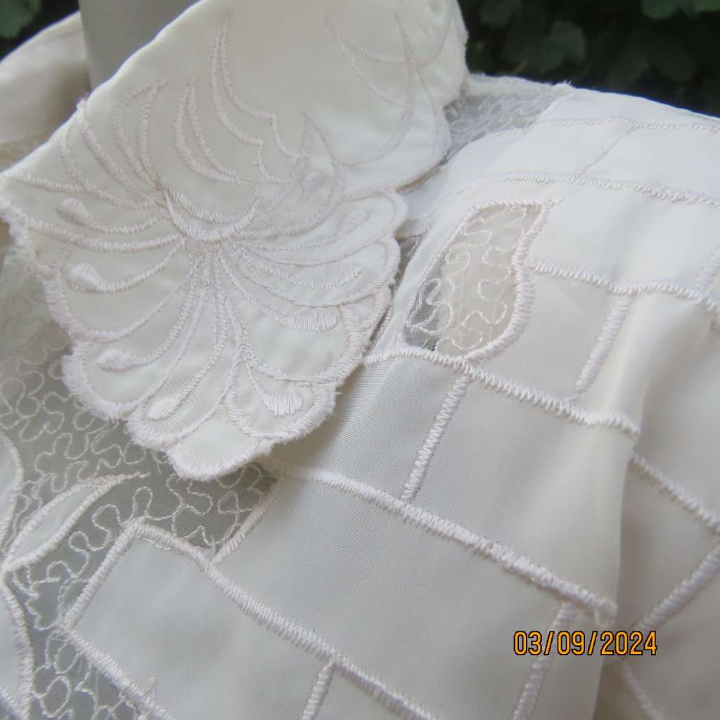Just amazing rich cream long sleeve luxury embroidered blouse. Large size 40. Label cut. Brand new.