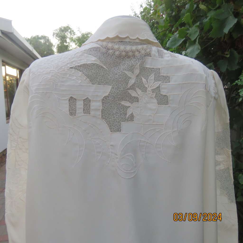 Just amazing rich cream long sleeve luxury embroidered blouse. Large size 40. Label cut. Brand new.