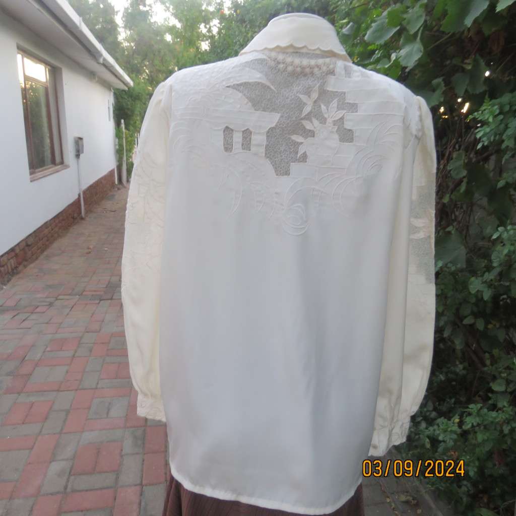 Just amazing rich cream long sleeve luxury embroidered blouse. Large size 40. Label cut. Brand new.