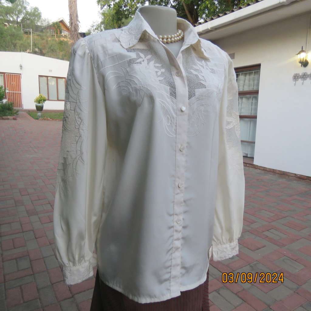 Just amazing rich cream long sleeve luxury embroidered blouse. Large size 40. Label cut. Brand new.