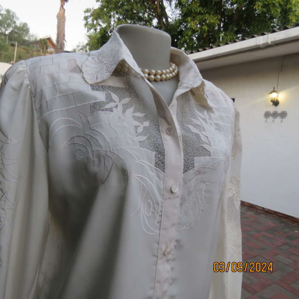 Just amazing rich cream long sleeve luxury embroidered blouse. Large size 40. Label cut. Brand new.