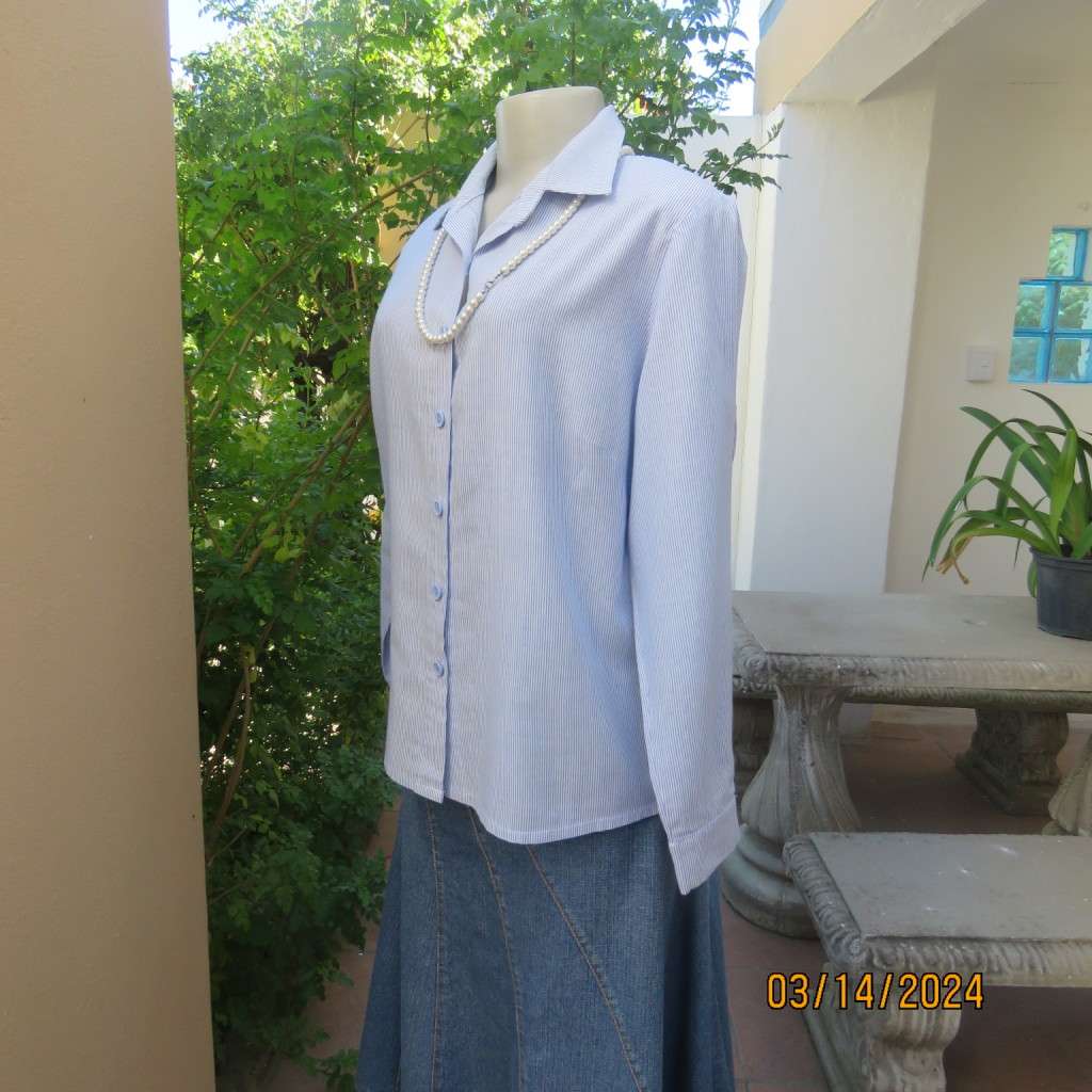 Casual long sleeve cotton blue/white striped button down shirt with collar. Size 40. No label.As new