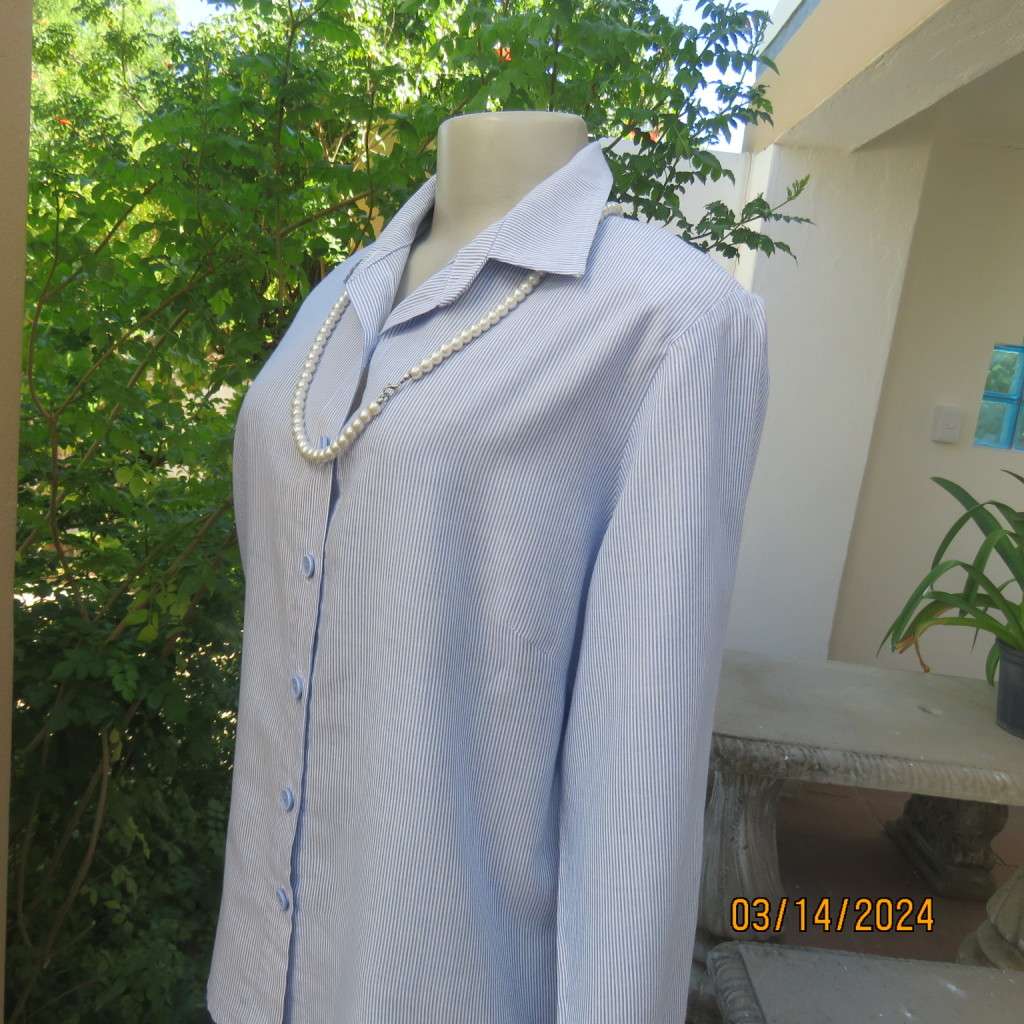 Casual long sleeve cotton blue/white striped button down shirt with collar. Size 40. No label.As new
