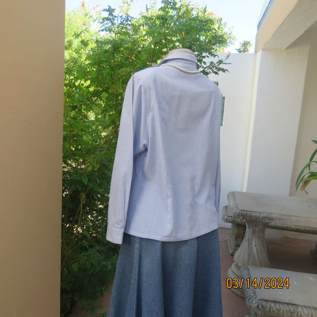 Casual long sleeve cotton blue/white striped button down shirt with collar. Size 40. No label.As new