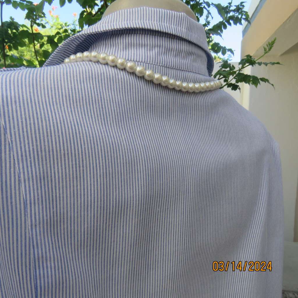 Casual long sleeve cotton blue/white striped button down shirt with collar. Size 40. No label.As new