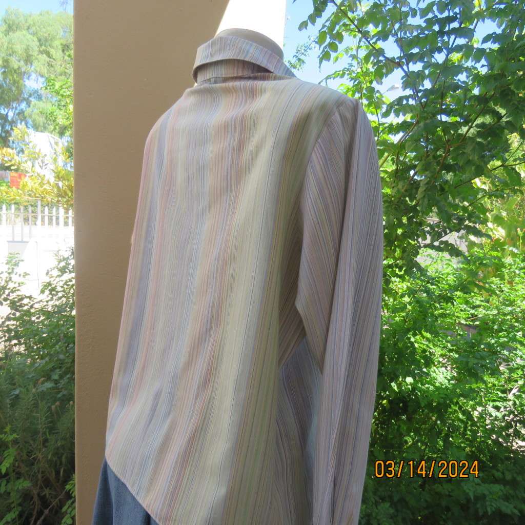 Pretty casual long sleeve shirt in different soft colour vertical stripes. Size 40. Boutique made.