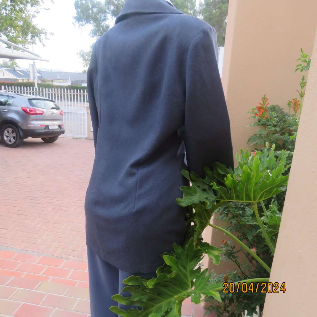 Elegant tailored steel blue/stripe pattern long sleeve jacket. By SMILEYS. Size 36. Brand new cond.