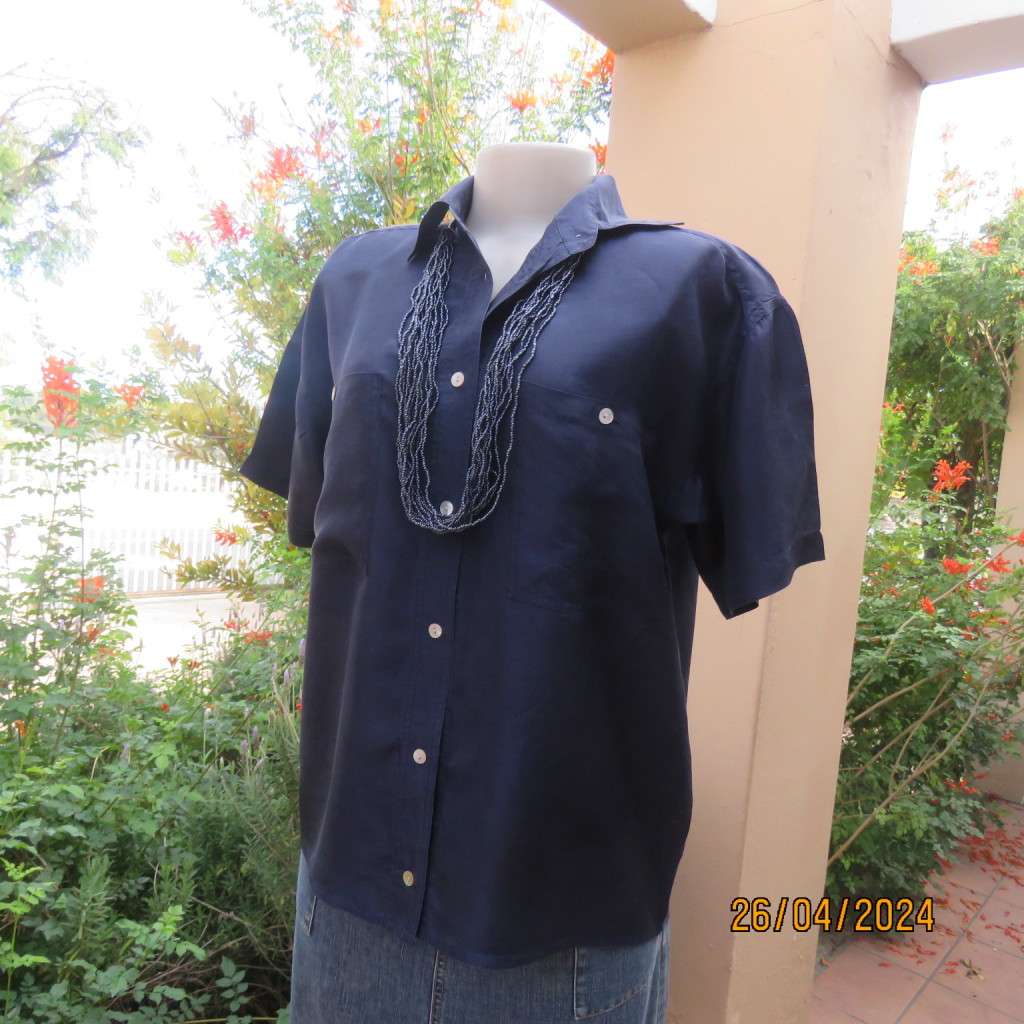 Smart 100% silk short sleeve navy button down top by NEWS size 36/38. Shirt collar.Very good cond.