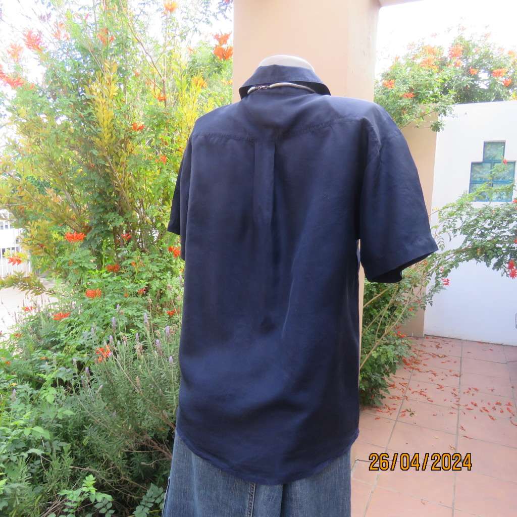 Smart 100% silk short sleeve navy button down top by NEWS size 36/38. Shirt collar.Very good cond.