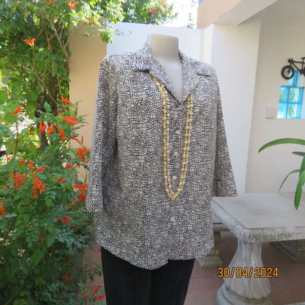 Charming black/cream graphic printed button down/open collar polyester top.JUDY`S PRIDE size 42