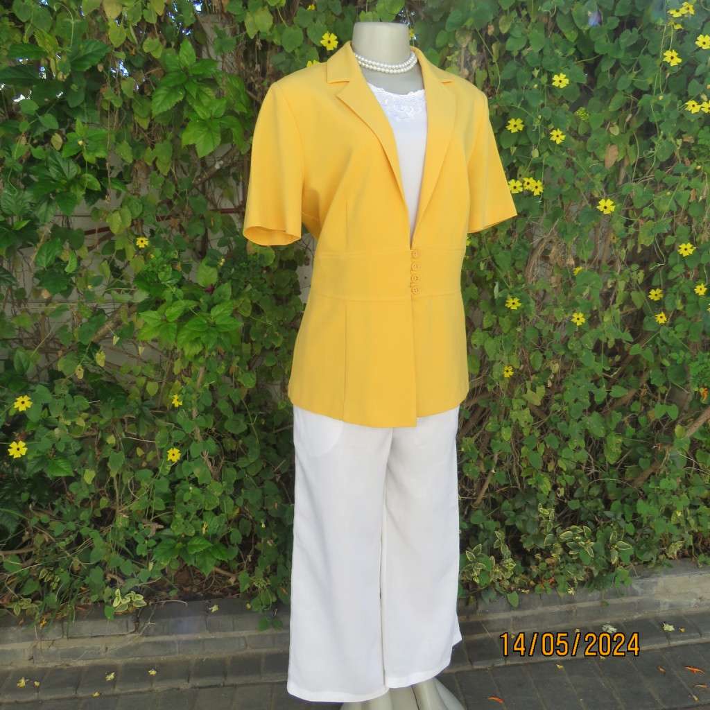 High quality short sleeve canary yellow heavy stretch cotton top/jacket. MILADYS size 36. Brand new