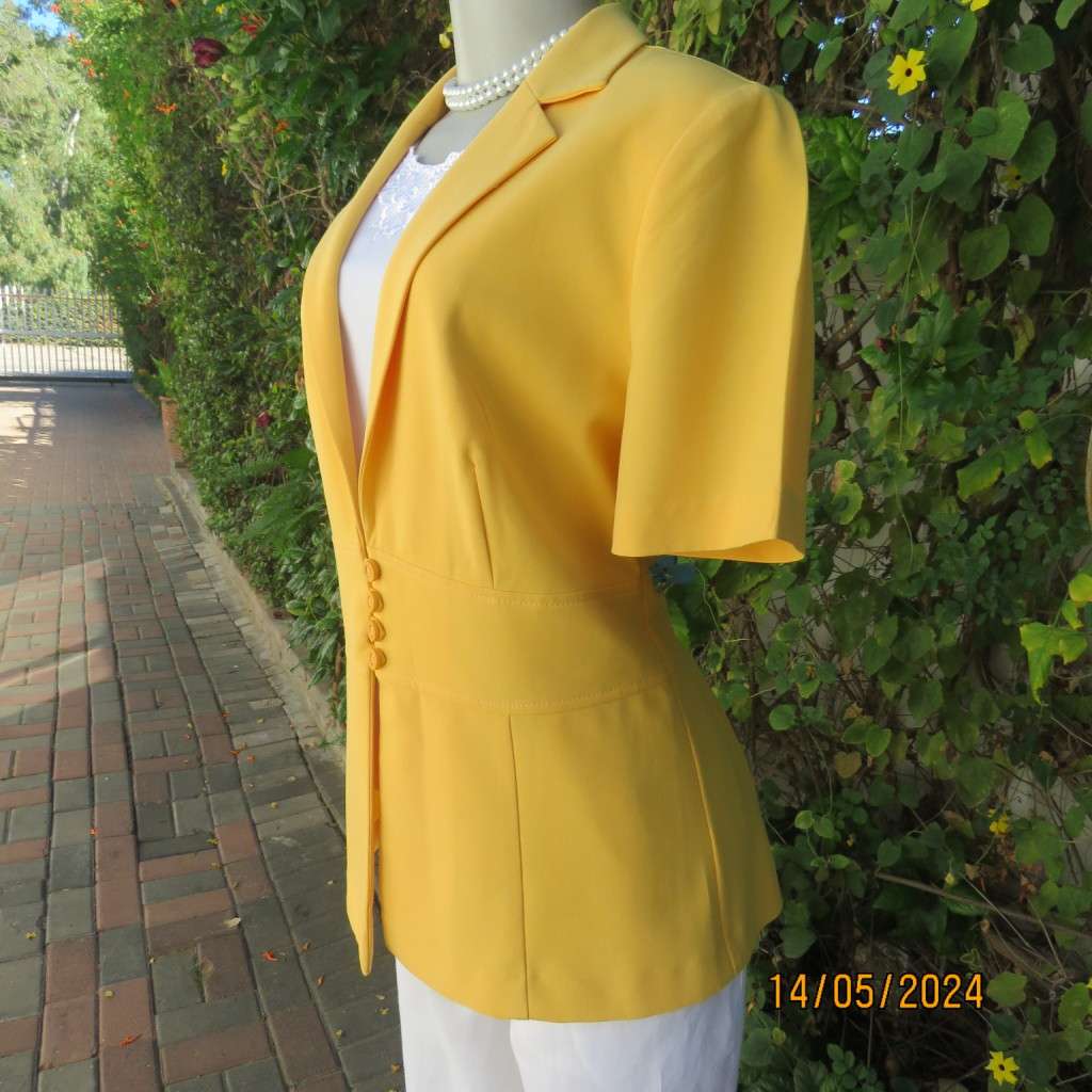 High quality short sleeve canary yellow heavy stretch cotton top/jacket. MILADYS size 36. Brand new