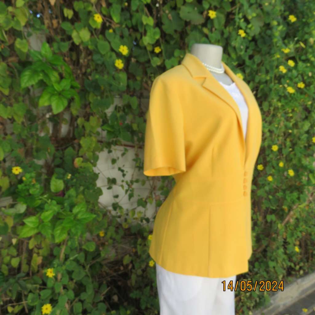 High quality short sleeve canary yellow heavy stretch cotton top/jacket. MILADYS size 36. Brand new