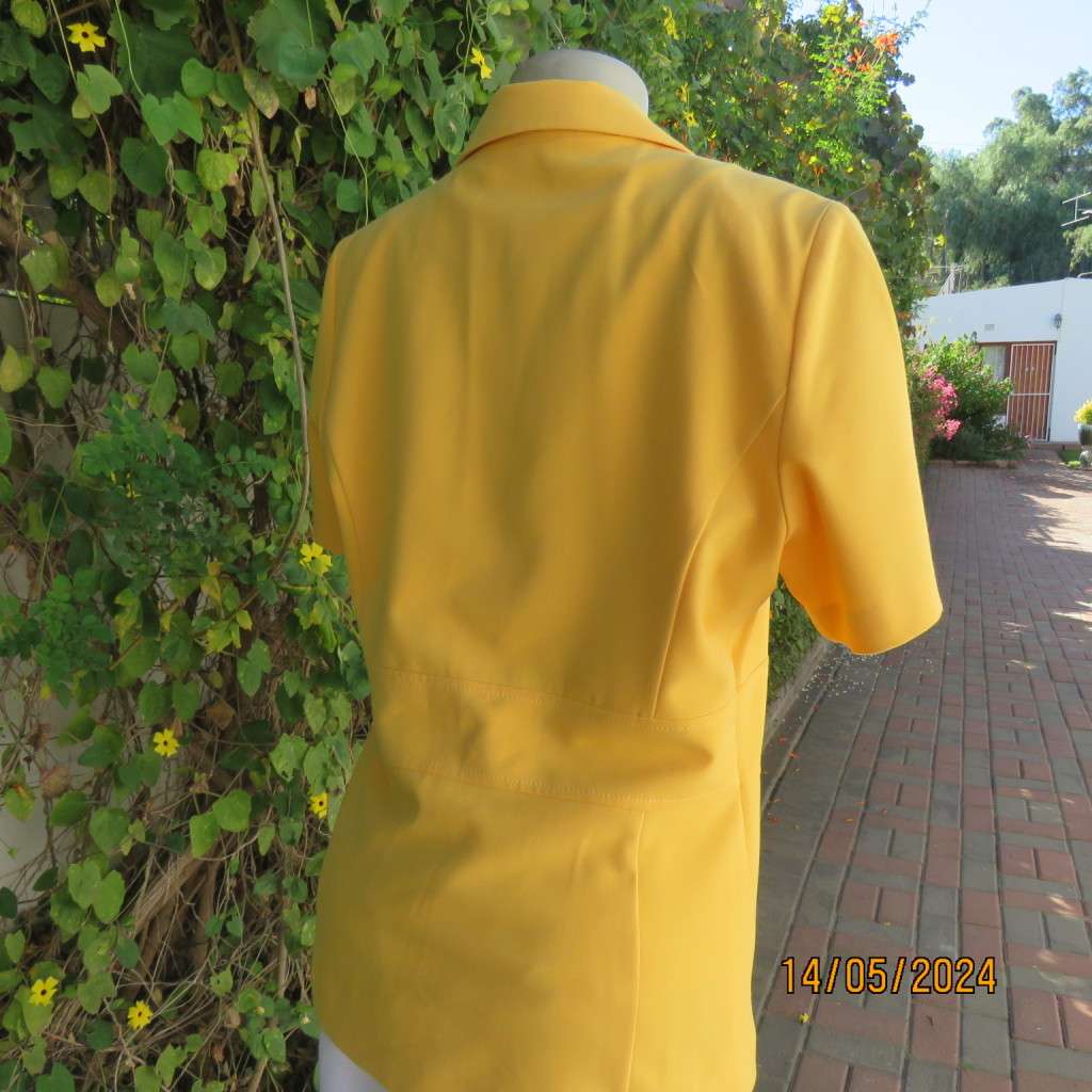 High quality short sleeve canary yellow heavy stretch cotton top/jacket. MILADYS size 36. Brand new