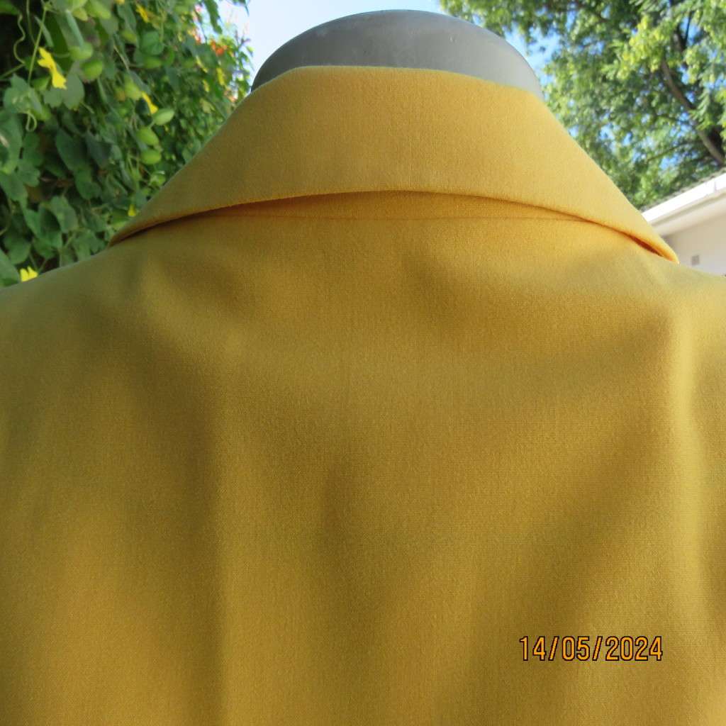 High quality short sleeve canary yellow heavy stretch cotton top/jacket. MILADYS size 36. Brand new