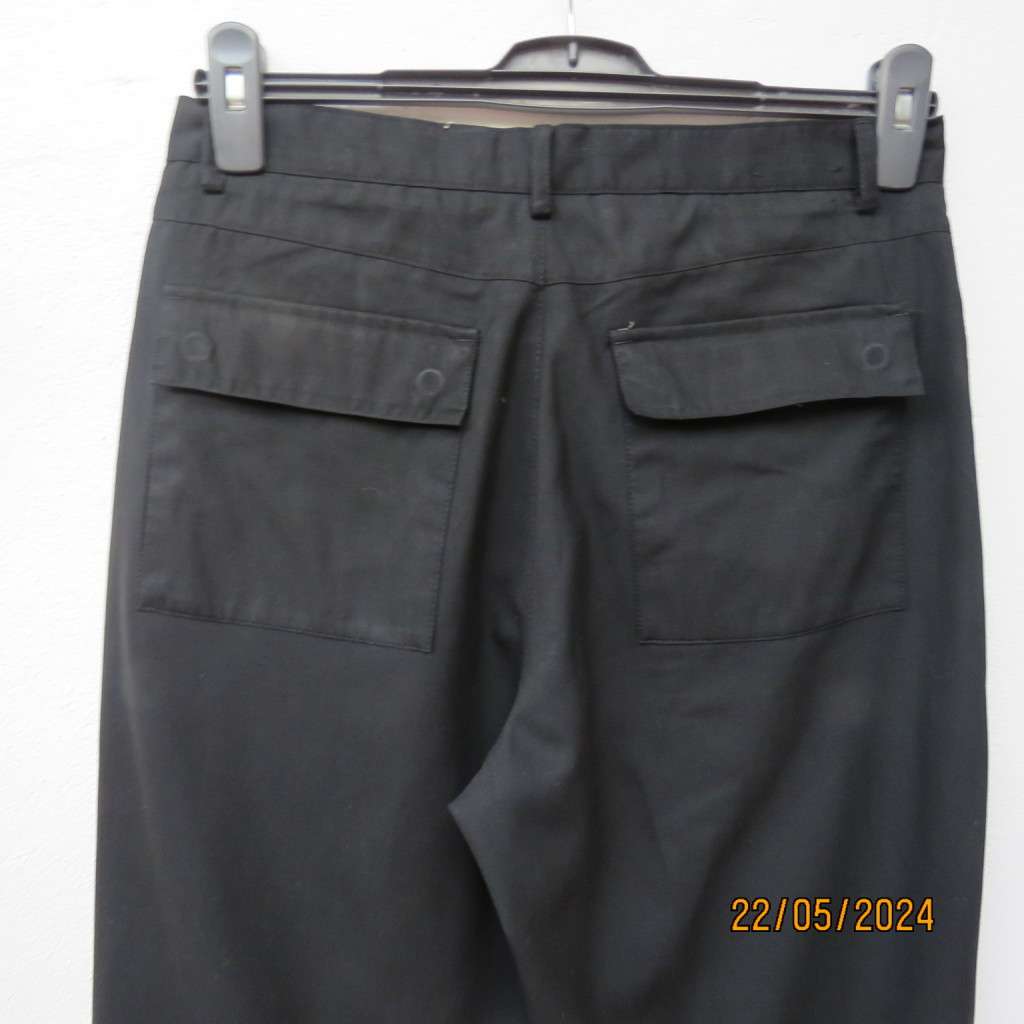 Very black Men`s poly/viscose light weight pants by CIGNAL size 32. Back flap pockets. Brand new con