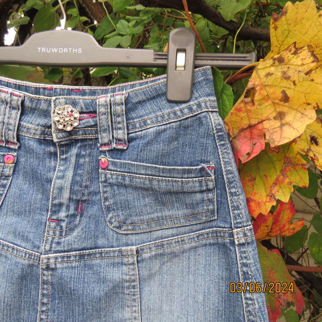 Sweet little blue denim jean a-line skirt for girl 9 to 10 yrs old. Polycotton stretch Front pockets