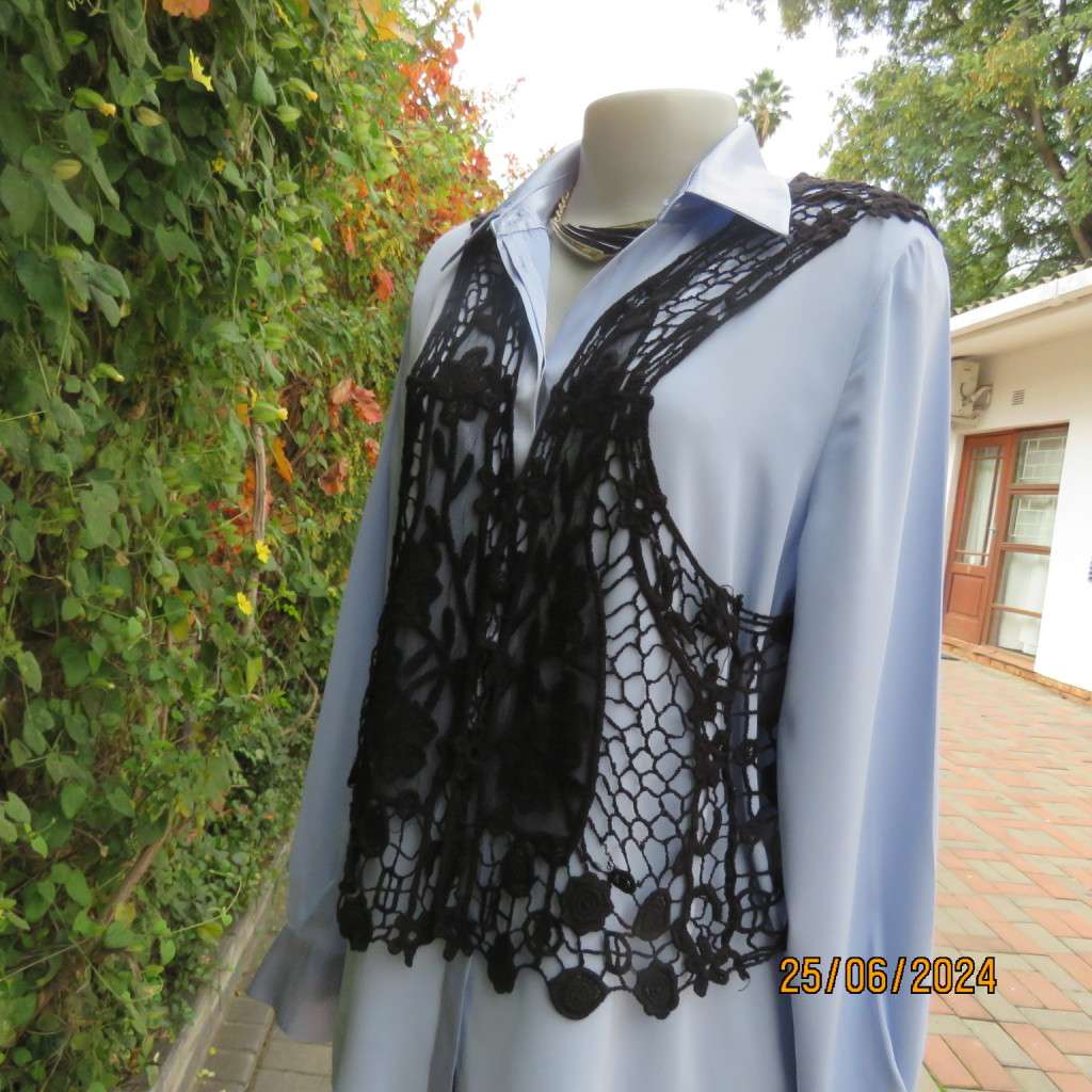 Chic black cotton lace/netting open waistcoat to give oemph to a garment. Size 36/38. New cond.
