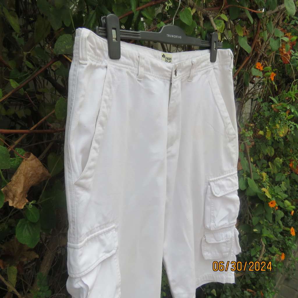 Men`s white 100% cotton cropped pants by RT DENIM size 34. Large bellow pockets leg sides. As new.