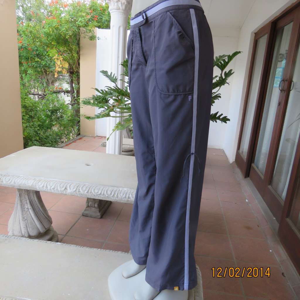 FUSION high quality grey polyester fitness pants. Blue bands at leg sides and front. Size 36.As new.