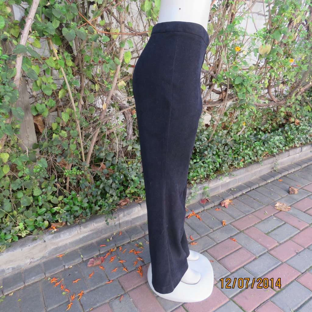 Warm stretch polyester/suede look bootcut black pants size 40 by KELSO. New condition.