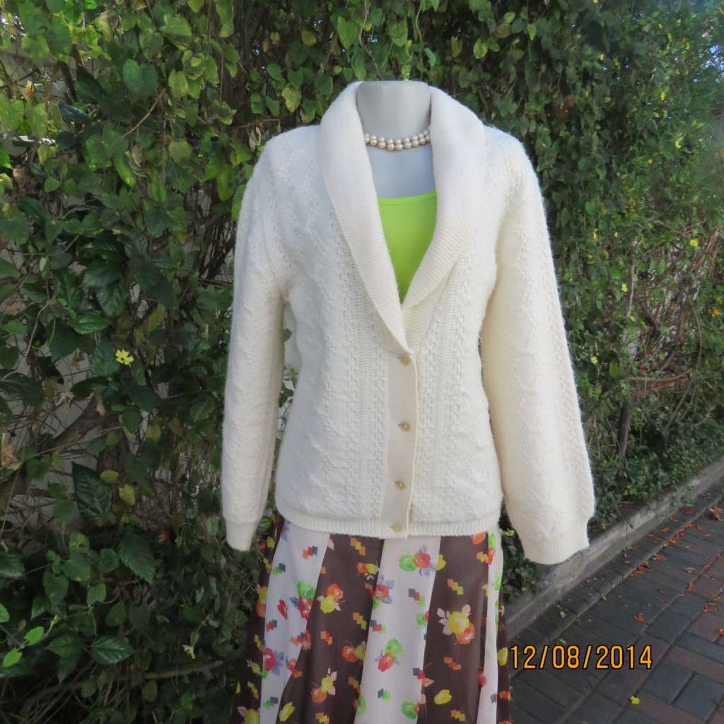 Fabulous rich cream patterned acrylic knit cardigan. Stunning shawl collar. By TEJ size 36/38.As new