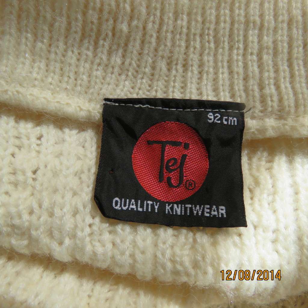 Fabulous rich cream patterned acrylic knit cardigan. Stunning shawl collar. By TEJ size 36/38.As new