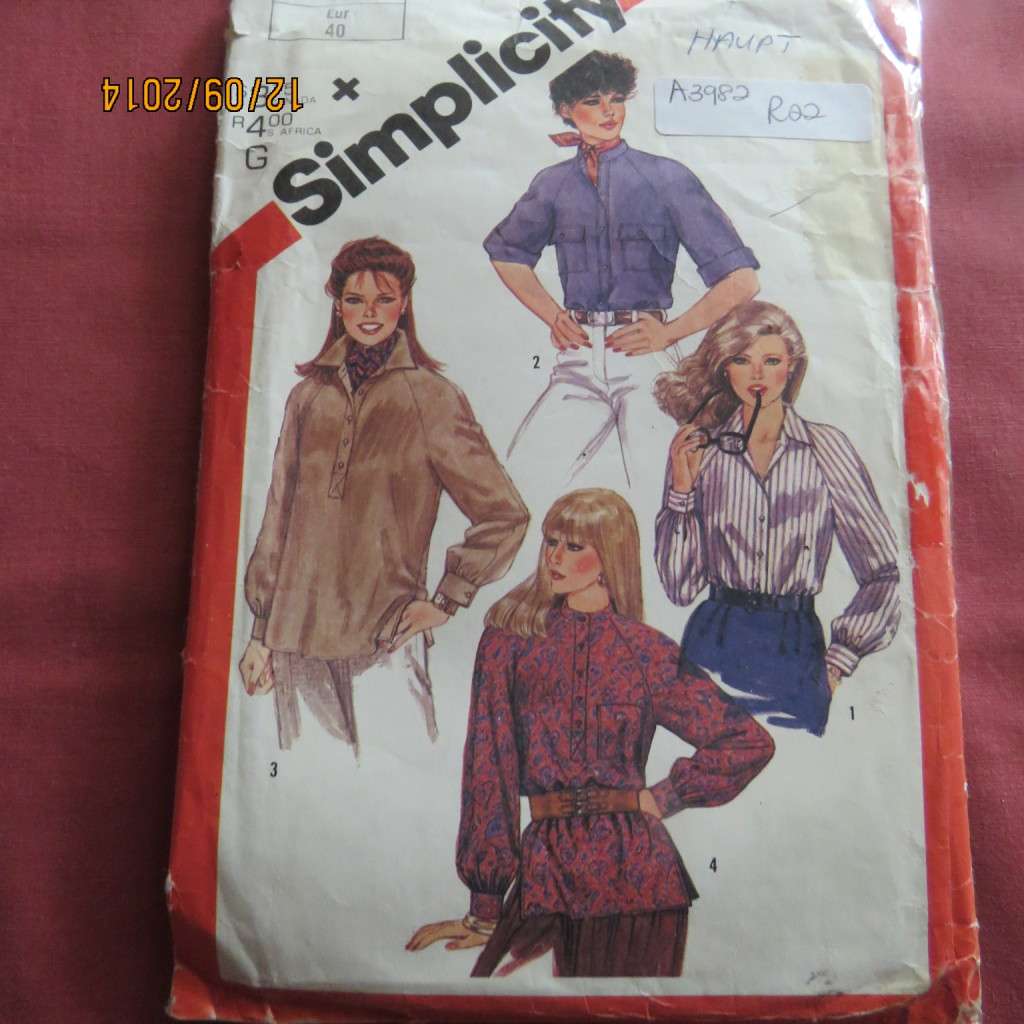 Sewing pattern by SIMPLICITY 5547 for blouse and slip over top. Complete
