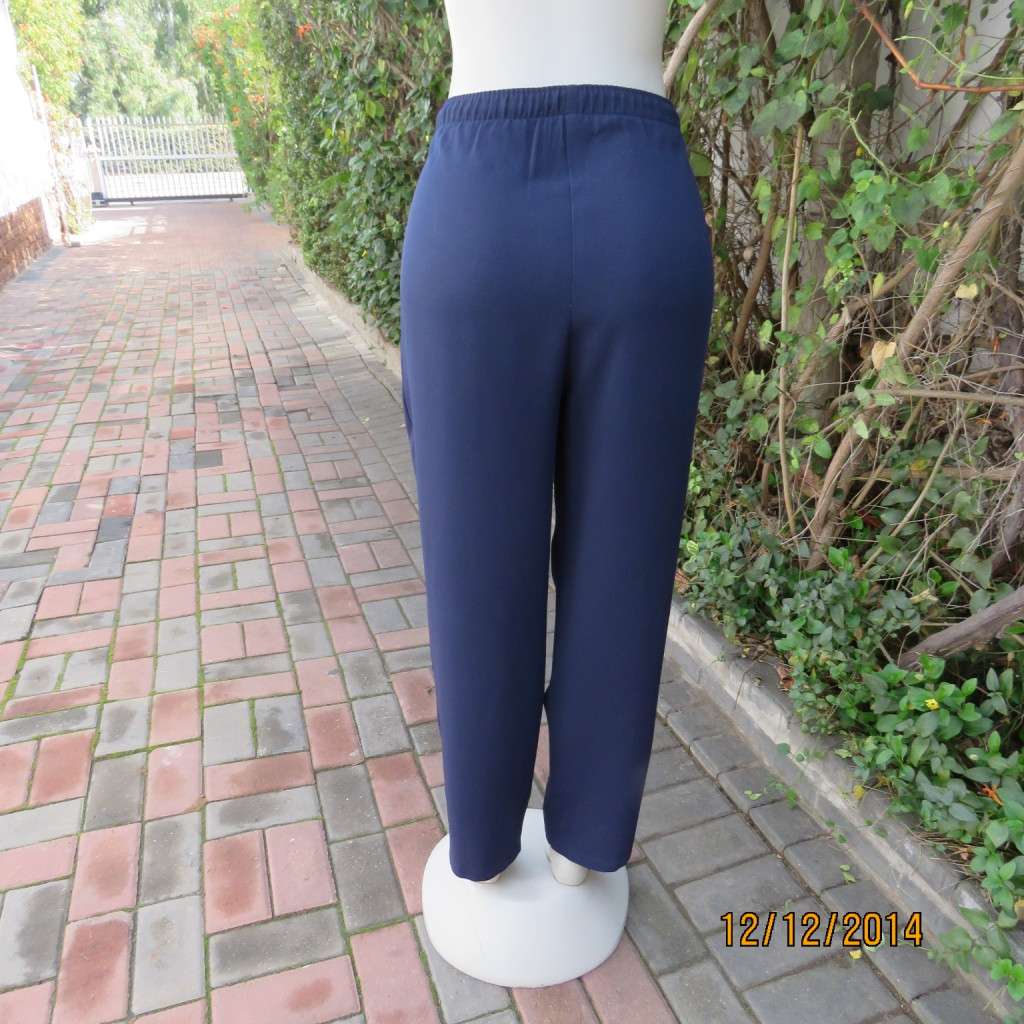 Comfy navy dress pants with plat front/elasticated waist back. Size 36 WOOLWORTHS. As new
