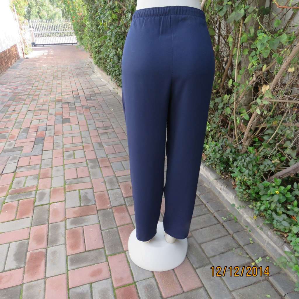 Comfy navy dress pants with plat front/elasticated waist back. Size 36 WOOLWORTHS. As new