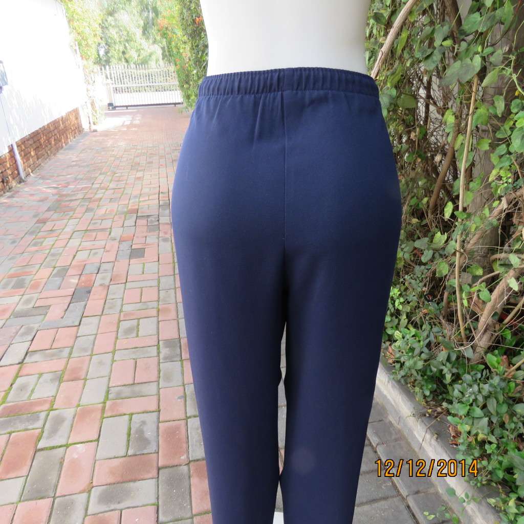 Comfy navy dress pants with plat front/elasticated waist back. Size 36 WOOLWORTHS. As new