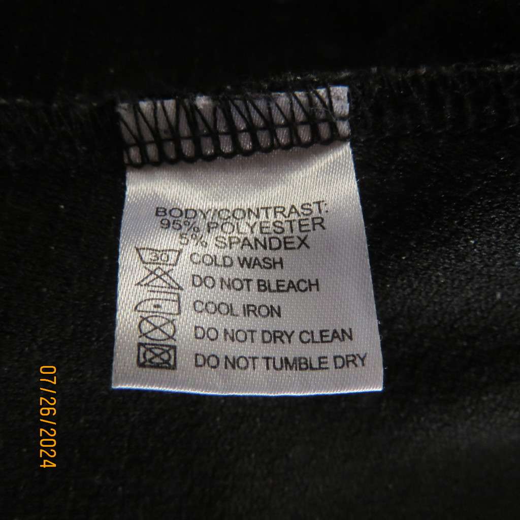 Amazing monochrome long sleeve jacket in textured stretch polyester.Size 34,Faux leather edging.