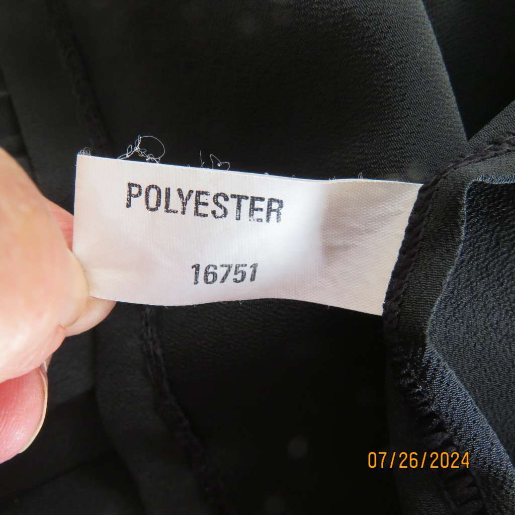 Very black silky,shiny knife pleated fold over ankle lenght skirt. Size 34/36 by TRUWORTHS. New cond