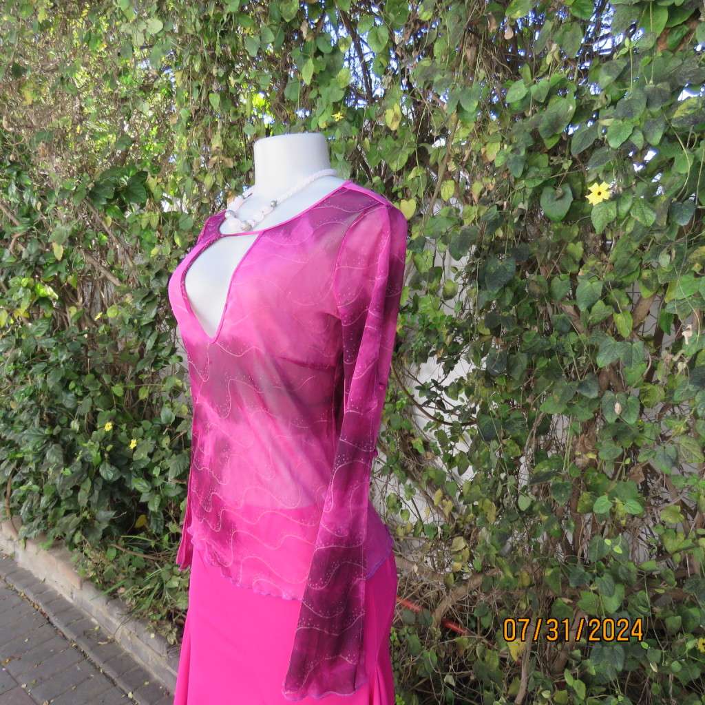 Sexy sheer stretch polyester slip over size 32 top in magenta pinks.Front peephole. As new.