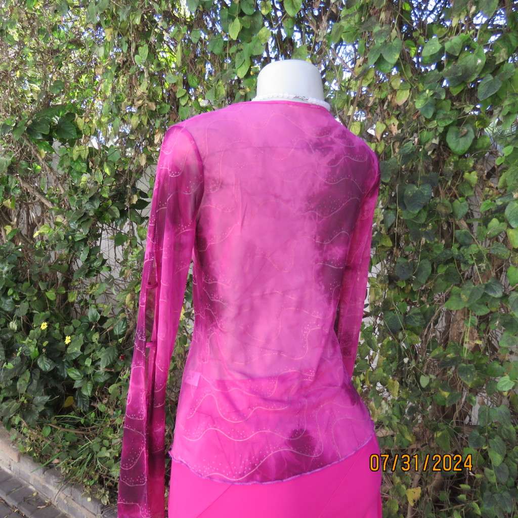 Sexy sheer stretch polyester slip over size 32 top in magenta pinks.Front peephole. As new.