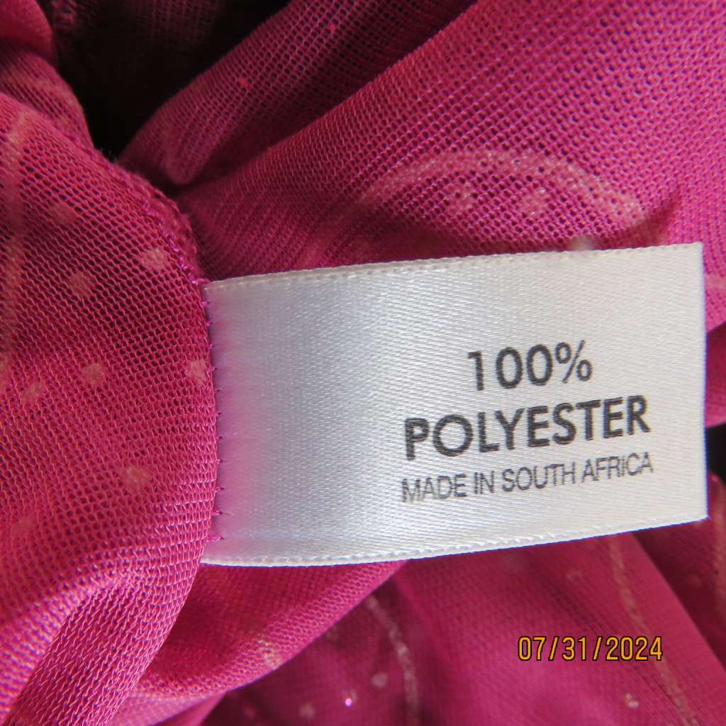 Sexy sheer stretch polyester slip over size 32 top in magenta pinks.Front peephole. As new.