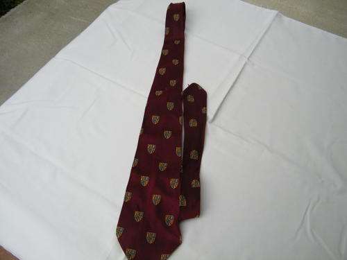 Dark Maroon necktie in Trevira by Duvay Neckwear. With unknown badges. As new