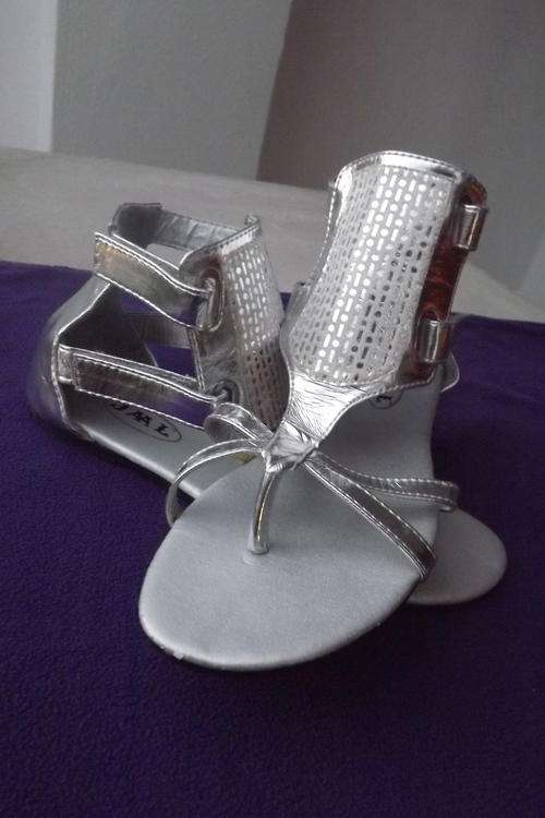 Pair of Silver Sandals with Ankle Straps in size 6