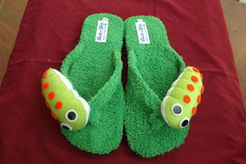 Pair of Green Flip Flop Character Slippers in size 7/8