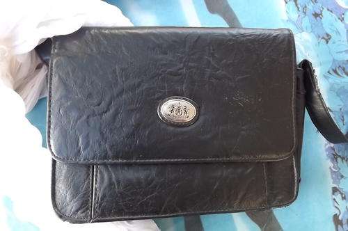 Crown Handbag from UK with lots of packing space - small 3cm mark on strap otherwise good condition
