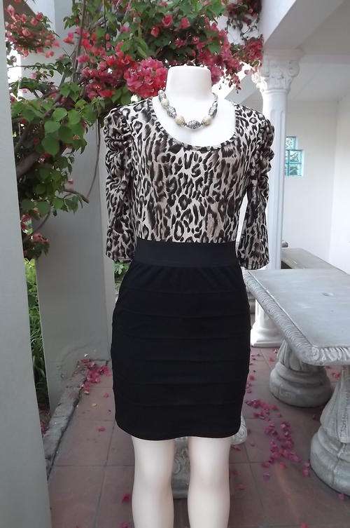 Trendy Dress with Animal Print Top and Black Bottom in size 10/34 by Lucy's Fashion - good condition