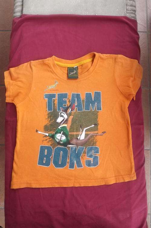 Orange Colour SA Rugby Boy's T Shirt for 6 to 7 year old - used but still in good condition